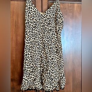 Mini Cheetah print dress with adjustable straps.